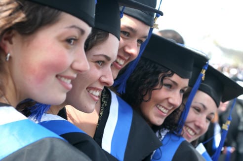 Graduating stydents in caps and gowns